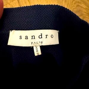 Lightly worn adorable Sandro dress in navy and white.